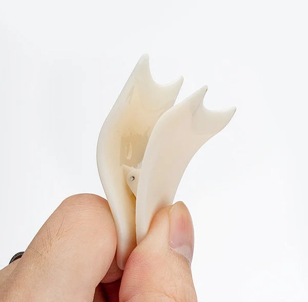 Artificial eyelash auxiliary clip